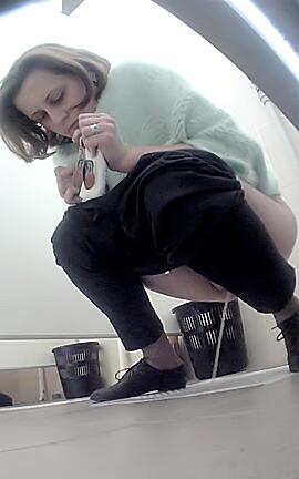 Young Female Students in the Toilet