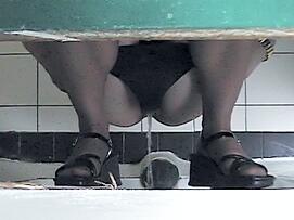 Women in a Public Toilet