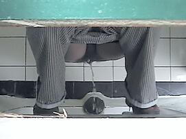 Women in a Public Toilet