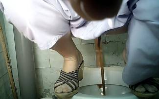 Pooping Women in Hospital Toilet